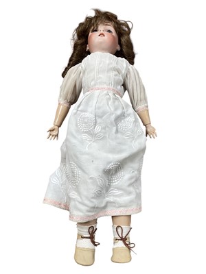 Lot 5122 - Antique German bisque doll, 61cm tall
