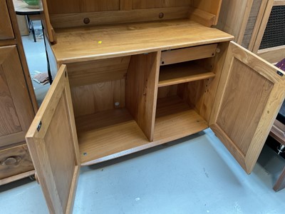 Lot 5325 - Ercol two height bookcase with adjustable shelves above and cupboards below, 91cm wide, 43.5cm deep, 162cm high