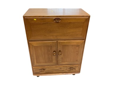Lot 5326 - Ercol drinks cabinet with fall front, two doors and single drawer below, 82cm, 43cm deep, 110cm high