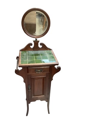 Lot 5337 - Edwardian walnut shaving stand with tiled top and circular bevelled mirror back, single drawer and cupboard below, 51cm wide, 35cm deep, 139cm high