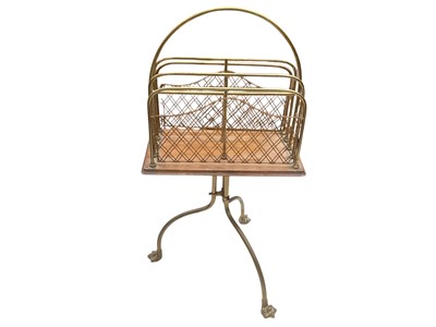 Lot 5343 - Victorian brass and oak revolving magazine rack, 75cm high