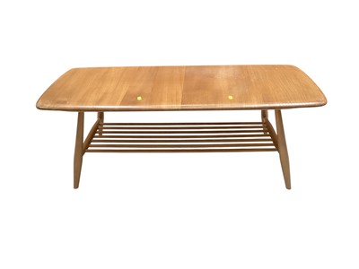 Lot 5344 - Ercol coffee table with magazine rack undertier, 103cm x 46cm x 36cm high