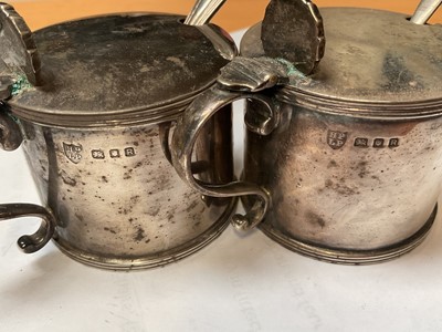 Lot 37 - Pair of Georgian style silver mustard pots, pair of Victorian silver salts and a pair of Victorian silver pepperettes