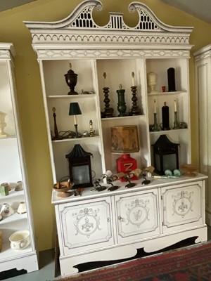 Lot 5369 - Highly decorative handmade and painted two height bookcase, with arched pediments and cupboards below, 180cm wide x 54cm deep x 295cm high
