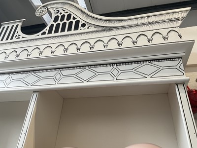Lot 5369 - Highly decorative handmade and painted two height bookcase, with arched pediments and cupboards below, 180cm wide x 54cm deep x 295cm high
