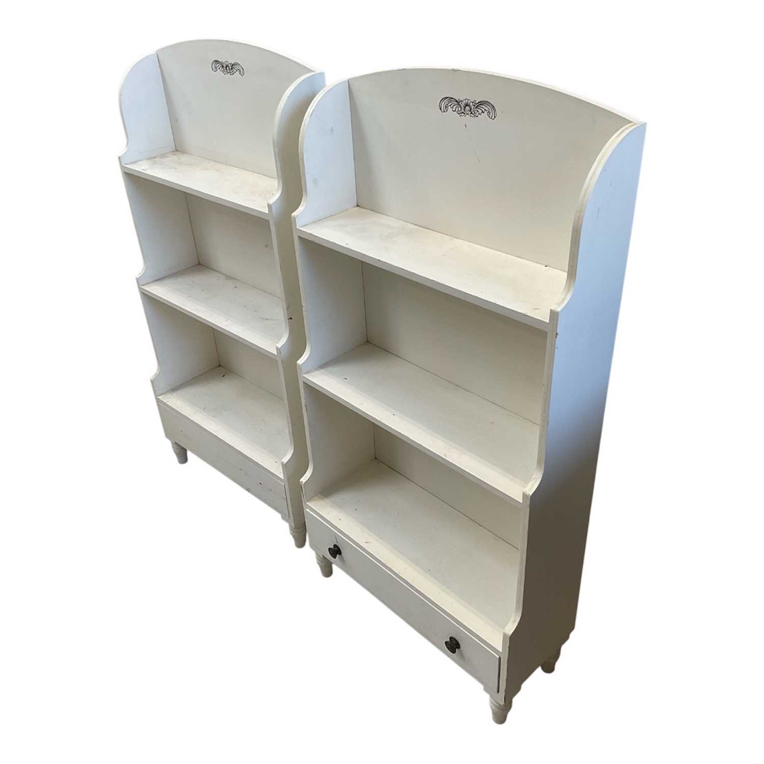 Lot 5373 - Pair of hand painted dwarf waterfall bookcases, with open graduated shelves and drawer below