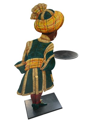 Lot 5163 - Stylish hand painted modern dummy board, in the form of a turbaned gentleman proffering a tray, painted to both faces