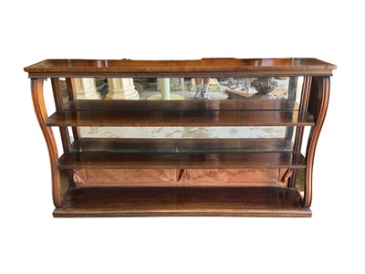 Lot 1514 - Late Regency set of rosewood open book shelves, with mirror back and three shelves between undulating supports, 152cm wide x 28cm deep x 86cm high