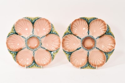 Lot 14 - Pair of late 19th century French Sarreguemines majolica glazed pottery oyster plates