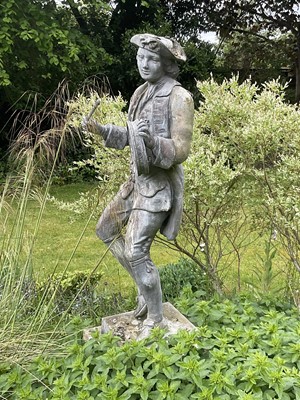 Lot 1517 - 18th century style lead garden sculpture of a drummer boy, on square base, 126cm high