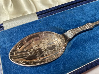 Lot 11 - Silver christening spoon with clock decoration to the bowl and a stork carrying a baby to the handle (Birmingham 1990), in fitted case