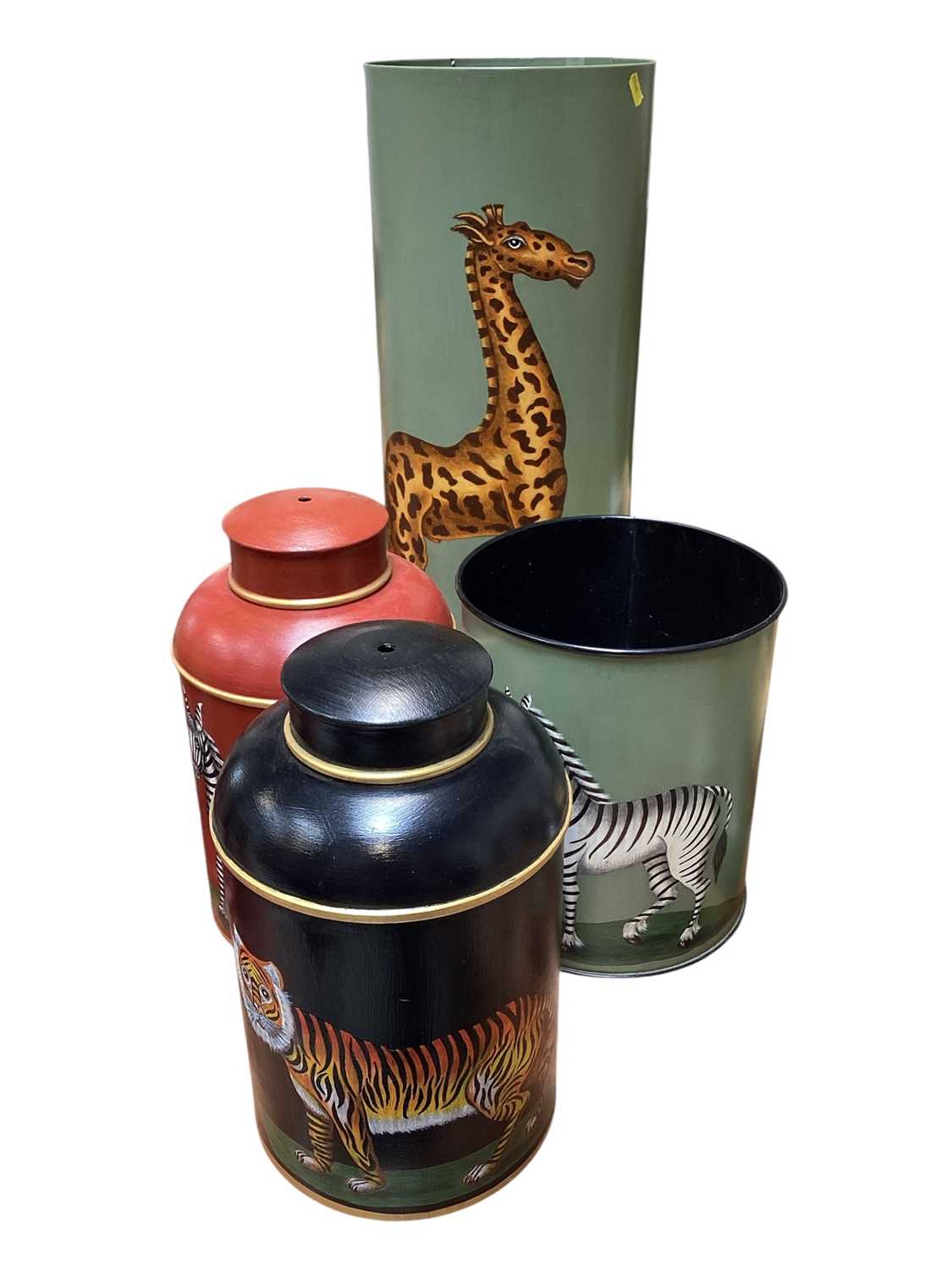 Lot 5154 - Two tôleware hand painted table lamps in the form of tea canisters, a similar waste paper bin and umbrella stand (4)