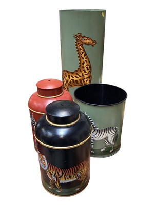 Lot 5154 - Two tôleware hand painted table lamps in the form of tea canisters, a similar waste paper bin and umbrella stand (4)