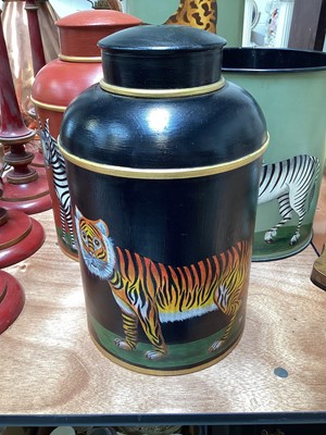 Lot 5154 - Two tôleware hand painted table lamps in the form of tea canisters, a similar waste paper bin and umbrella stand (4)