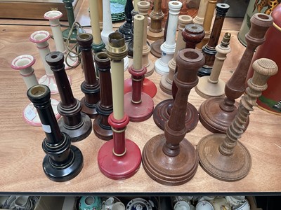 Lot 5155 - Collection of turned and painted wooden candlesticks and candlestick table lamps