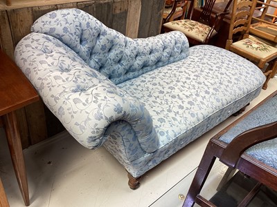 Lot 5356 - Victorian chaise lounge sofa with button blue floral upholstery on turned wooden legs and original casters, 193cm wide