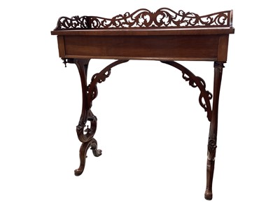 Lot 5357 - Good quality Victorian walnut side table with pierced fret work galleried back, frieze drawer on carved and pierced end standards, 78cm wide x 86cm tall x 33cm deep