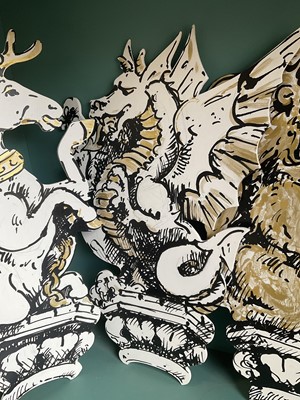 Lot 5169 - Set of four stylish hand painted dummy boards, in the form of busts of heraldic beasts