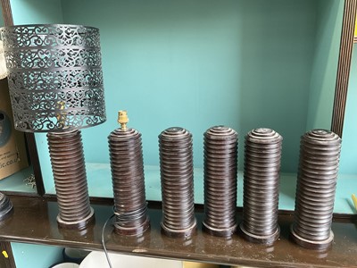 Lot 5171 - A set of six turned wooden lamp bases, including one with pierced metal shade