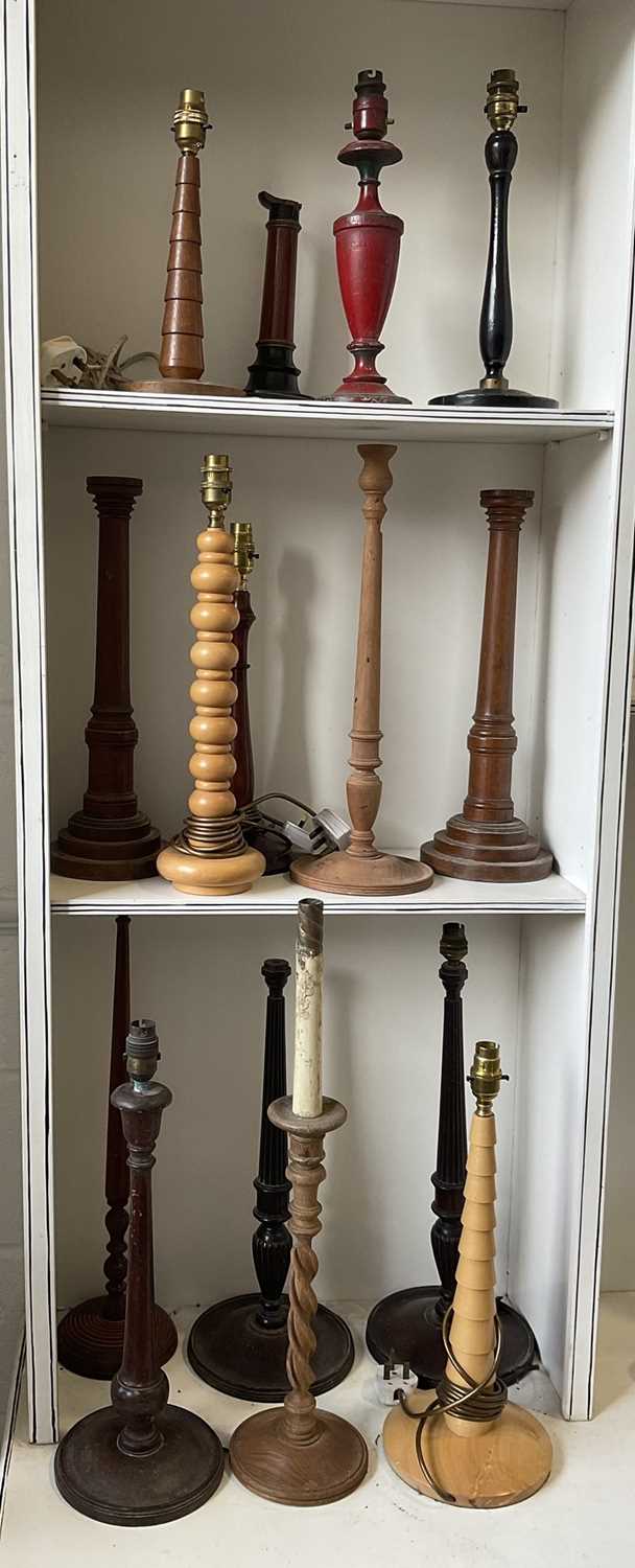 Lot 5201 - Good group of hand turned wooden lamp bases (15)