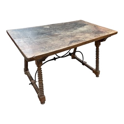 Lot 1522 - 18th / 19th century Spanish walnut dining table, with substantial plank top on bobbin turned end supports united by metal stretchers