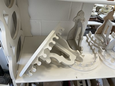 Lot 5224 - Large collection of cream wooden wall brackets and composite parts, easily constructed for a very large number of brackets