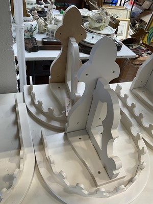 Lot 5224 - Large collection of cream wooden wall brackets and composite parts, easily constructed for a very large number of brackets