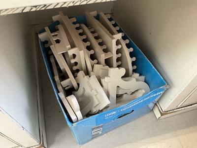 Lot 5224 - Large collection of cream wooden wall brackets and composite parts, easily constructed for a very large number of brackets