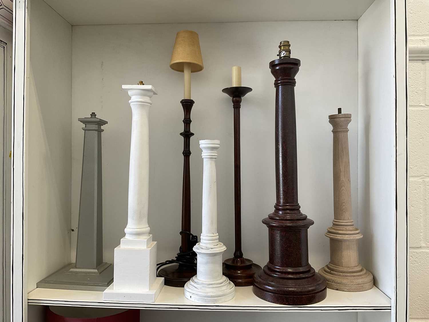 Lot 5225 - Collection of turned wooden lamp bases, the largest with marbled finish, 66cm high (7)