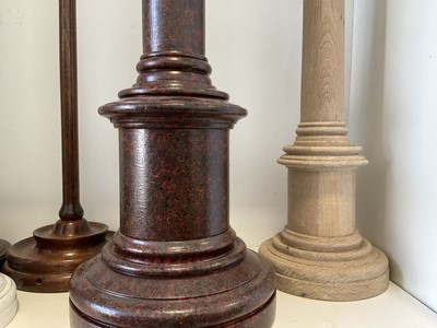 Lot 5225 - Collection of turned wooden lamp bases, the largest with marbled finish, 66cm high (7)