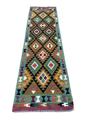 Lot 5297 - Kilim rug Measuring 293cm x 80cm