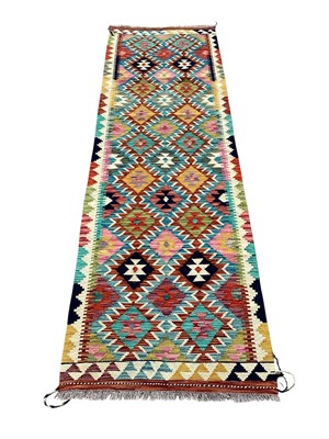 Lot 5296 - Kilim rug measuring 251cm x 77cm
