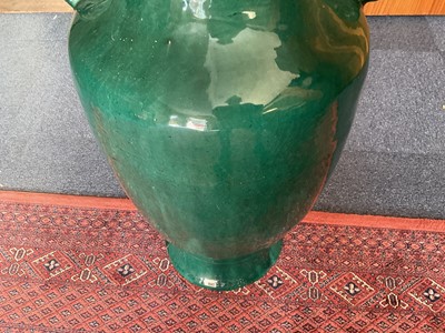 Lot 5158 - Very large green glazed Oriental vase, 105cm high