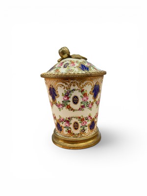 Lot 5237 - 19th century Sèvres style porcelain pot and cover, decorated in enamels and gilt with floral swags and scrollwork, with ormolu mounts, marked to base, 11.5cm high