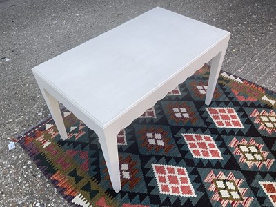 Lot 5380 - Cream painted coffee table with shaped apron on square taper legs, 46cm deep x 79cm wide x 49cm high