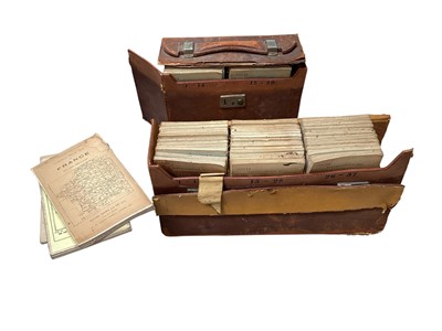 Lot 5254 - Two leather cases containing Bartholomew's cloth backed maps of England, Scotland and Wales, together with a group of Taride's road maps of France