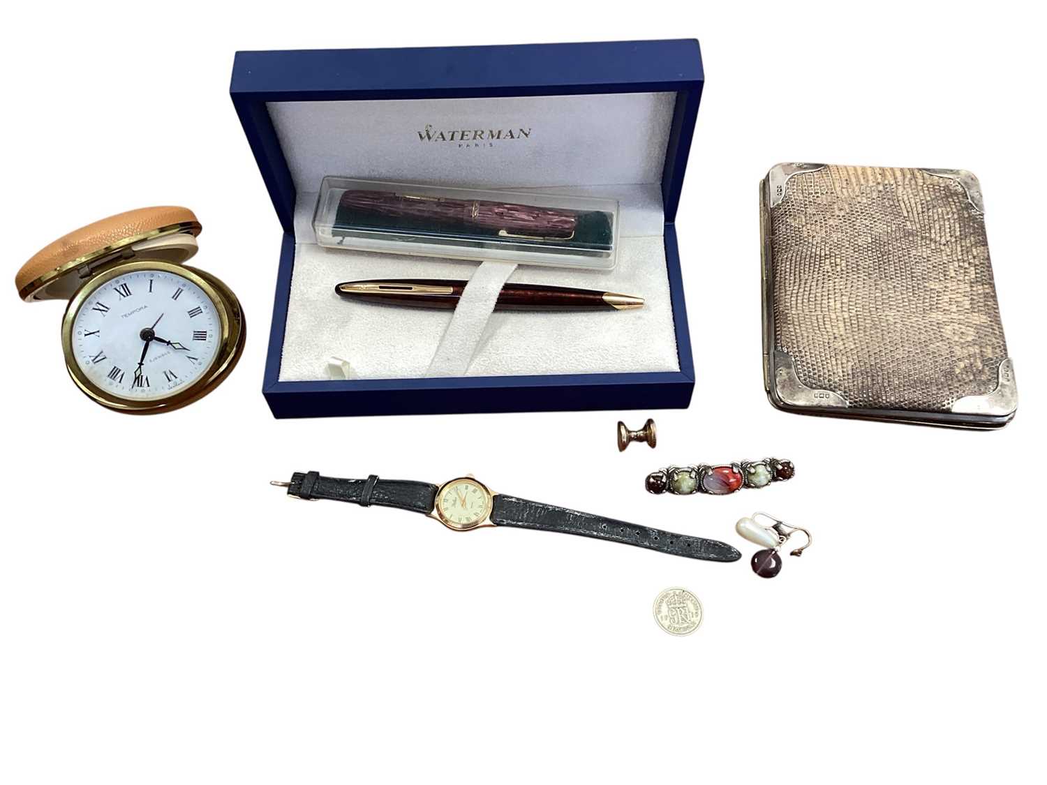 Lot 5394 - Silver and lizard skin wallet, together with two waterman pens in the box, a Tempora travel clock and other jewellery