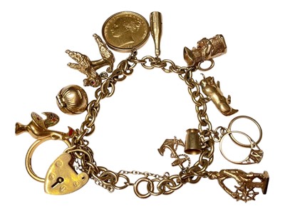 Lot 51 - Gold charm bracelet with a Victorian gold full sovereign 1872, 22ct gold wedding ring, various 9ct gold charms etc