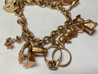 Lot 51 - Gold charm bracelet with a Victorian gold full sovereign 1872, 22ct gold wedding ring, various 9ct gold charms etc