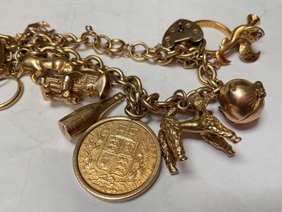 Lot 51 - Gold charm bracelet with a Victorian gold full sovereign 1872, 22ct gold wedding ring, various 9ct gold charms etc