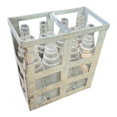 Lot 15 - Collection of eight Esso 'Essolube' 1 Quart glass oil bottles in original branded carrier.