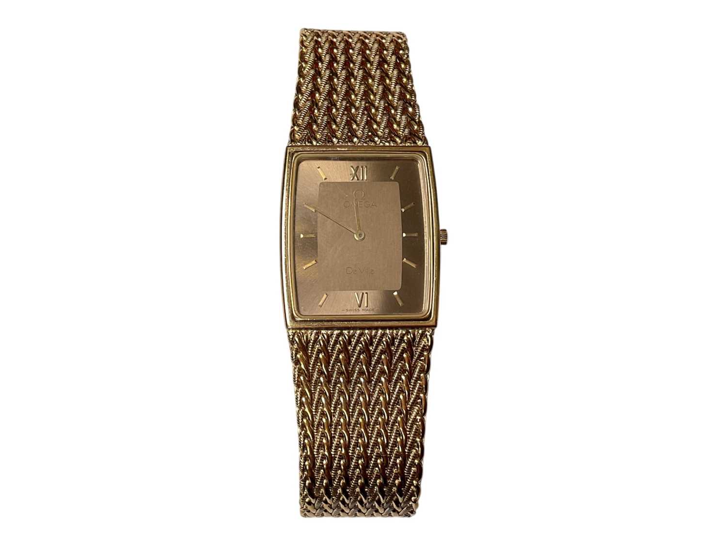 Lot 1 - 1980s Omega De Ville gold plated wristwatch, in travel case with guarantee booklet