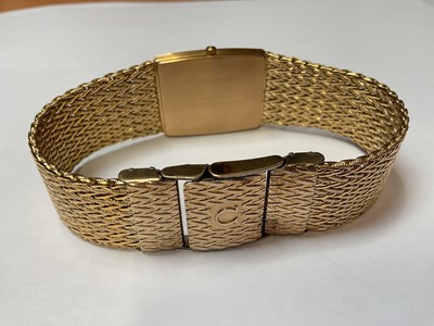 Lot 1 - 1980s Omega De Ville gold plated wristwatch, in travel case with guarantee booklet