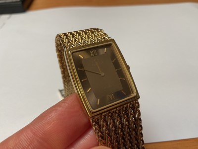 Lot 1 - 1980s Omega De Ville gold plated wristwatch, in travel case with guarantee booklet
