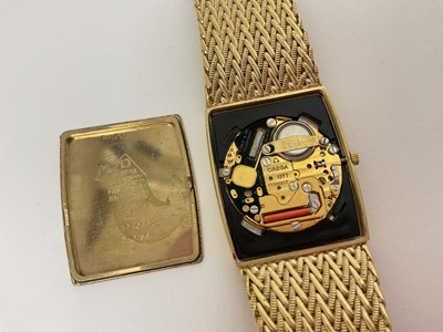 Lot 1 - 1980s Omega De Ville gold plated wristwatch, in travel case with guarantee booklet