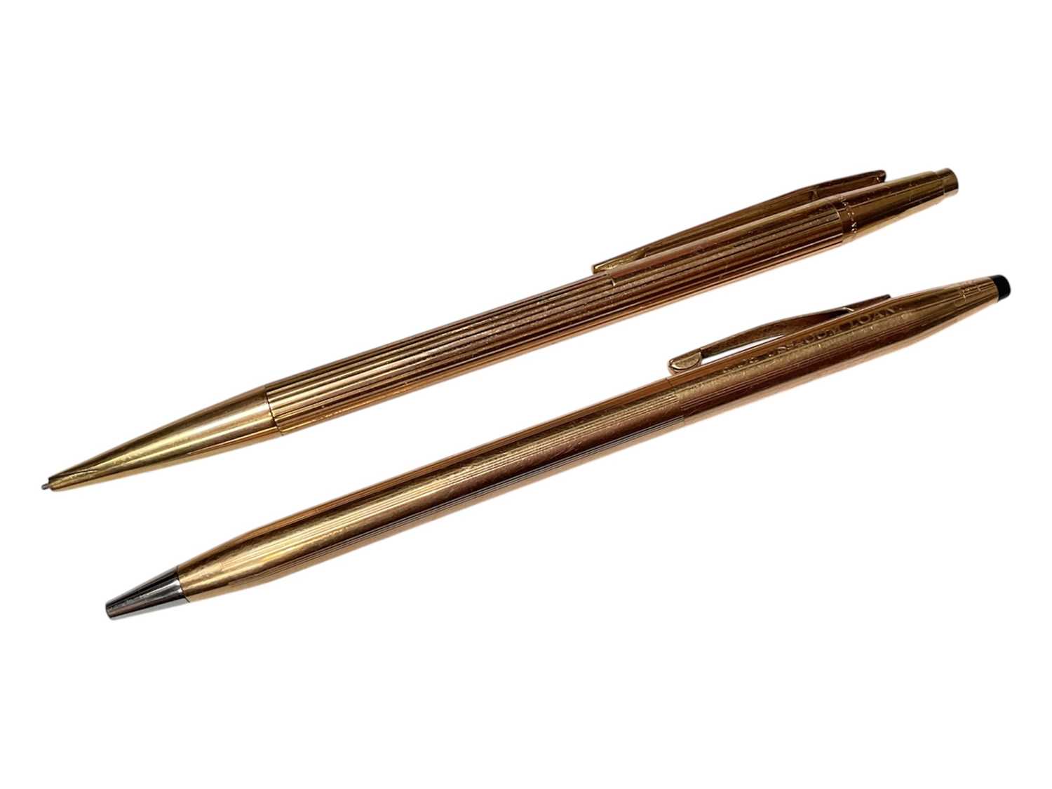 Lot 47 - Montblanc gold plated propelling pencil and a Cross gold plated ball point pen (2)