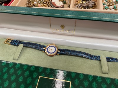 Lot 38 - Group of costume jewellery, some silver jewellery and various watches including a Gucci wristwatch with red and blue enamel decoration and a blue leather strap in case