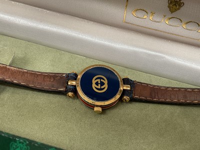 Lot 38 - Group of costume jewellery, some silver jewellery and various watches including a Gucci wristwatch with red and blue enamel decoration and a blue leather strap in case