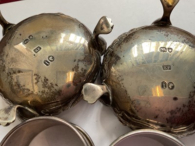 Lot 85 - Pair of Victorian silver cauldron salts, one other silver salt, silver condiment pot, four various silver salts spoons and four silver napkin rings