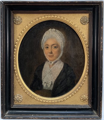 Lot 1027 - English School, late 18th century, oil on canvas - Portrait of a Lady, 25cm x 21.5cm, oval, with gesso slip in ebonised frame